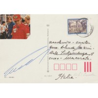 Autografo di Niki Lauda su cartolina con foto Ferrari
