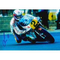 Autografo di Marco Lucchinelli su moto da gara numero 2 in pista